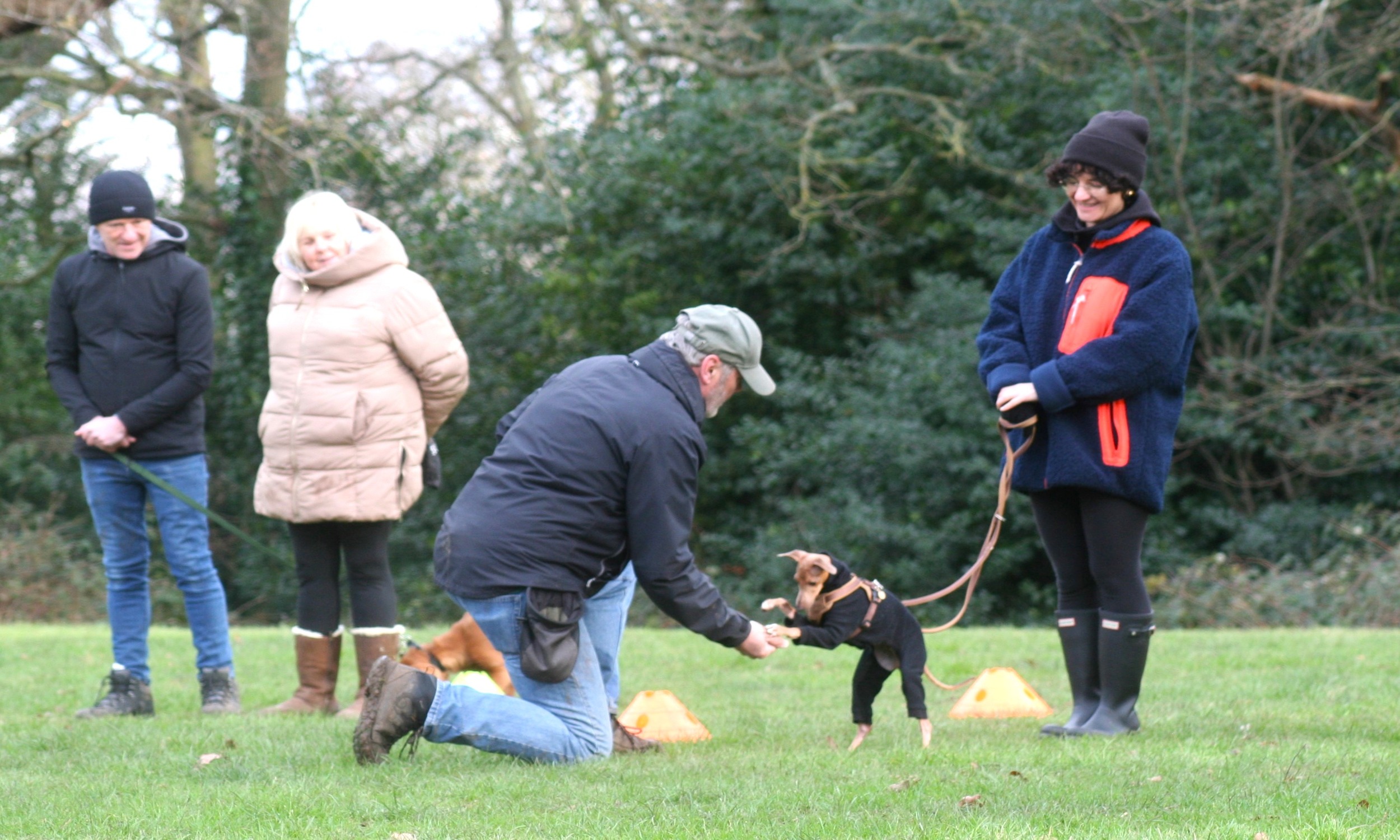 Roy the dog trainer, teaching at a group class A photograph of Roy the dog trainer, teaching at a group class
